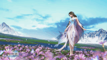 a woman in a white dress is standing in a field of purple flowers with mountains in the background