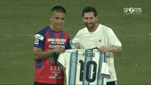 two soccer players are posing for a picture and one of them is wearing a shirt that says messi