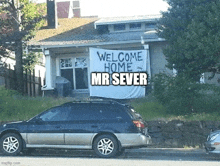 a car is parked in front of a house that has a welcome home mr sever sign