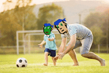 a man and a child are playing with a soccer ball in a field