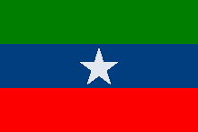 a green blue and red flag with a white star on it