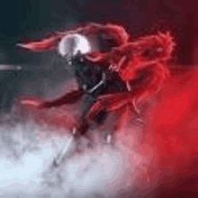 a person in a mask is flying through the air in a red smokey room .