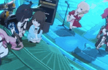 a group of anime girls are playing instruments in a band on a stage .