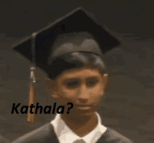 a young boy wearing a graduation cap and gown with the words kathala written on the bottom