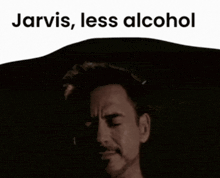 a man with his eyes closed and the words jarvis , less alcohol below him