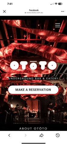 a phone screen shows a page for ototo underground bar and eatery