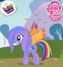 a purple pony with wings and a rainbow tail is in a happy studio advertisement