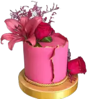 a pink cake with roses and a pink flower on top