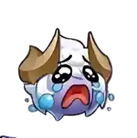 a cartoon character with horns is crying and has tears running down its face .