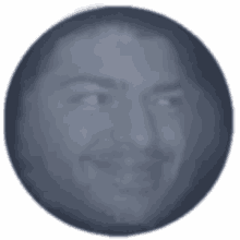 a gray circle with a man 's face in it