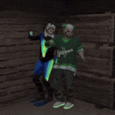 a man in a green sprite shirt stands next to a man in a blue suit