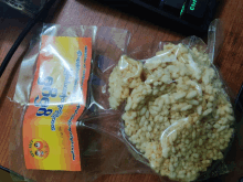 a bag of rice crackers with a yellow and orange label that says ' myanmar ' on it