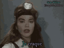 a woman with a light on her head and the words je craque