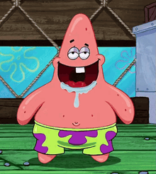 patrick star from spongebob squarepants is standing on a wooden floor