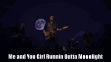 a man singing into a microphone with the words me and you girl runnin outta moonlight behind him