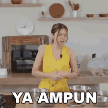 a woman in a yellow dress is standing in a kitchen holding a knife and a bowl of food .