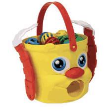 a yellow bucket with a red handle is filled with toys