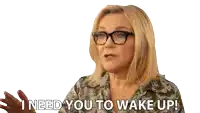 a woman wearing glasses and a shirt says i need you to wake up