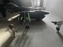 a lego star wars scene with a storm trooper holding a lightsaber