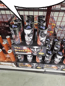 several cans of the prankster fireworks are on display in a store