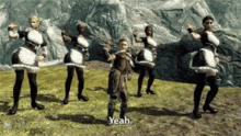 a group of maids are dancing in a video game and one of them is saying " yeah "