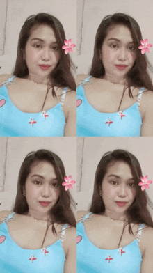 a woman wearing a blue tank top with flowers on her face