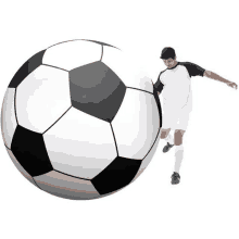 a soccer player is kicking a soccer ball