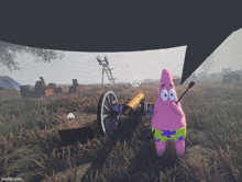 patrick star from spongebob is holding a cannon in a video game