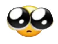 a close up of a smiley face with big eyes