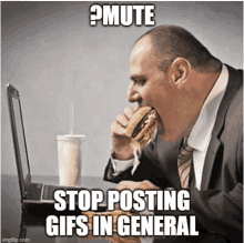 a man in a suit is eating a hamburger in front of a laptop with the words " mute stop posting gifs in general "