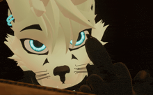 a close up of a cat 's face with blue eyes and a black nose