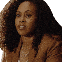 a woman with curly hair is wearing a brown jacket and a necklace with the number 23 on it