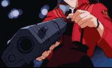 a girl in a red jacket is holding a gun in her hand .