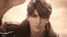 a close up of a young man 's face with a hand behind his head