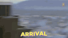 the word arrival that is on a blurry picture