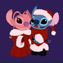 a couple of cartoon characters standing next to each other wearing santa outfits