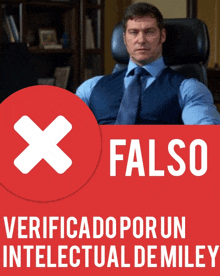 a man in a blue shirt and tie sits in a chair with a red sign that says verificado