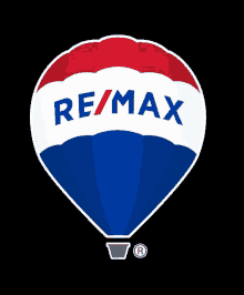 a red white and blue hot air balloon with the re/max logo on it