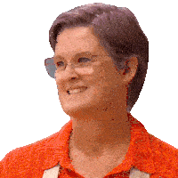 a woman wearing glasses and an orange shirt smiles for the camera