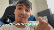 a man giving a thumbs up with the words you are very sneaky written below him
