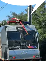 a silver and black train with the number 467 on the front