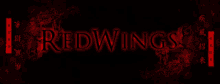 the word redwings is on a dark background