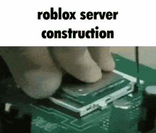 a picture of a person working on a computer with the words roblox server construction