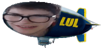 a blimp with a person 's face and the word lul on it