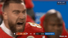 a cbs sports screen shows a football game between the kansas city chiefs and the san francisco 49ers