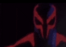 a blurred image of a spiderman in a red and blue costume