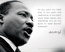 a black and white photo of martin luther king jr. with a quote by him