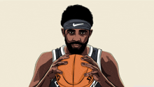 a man wearing a nike headband is holding a basketball in his hands