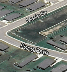 an aerial view of a residential area with mario dr. and pong path