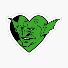 a green goblin with red eyes is in a heart shape